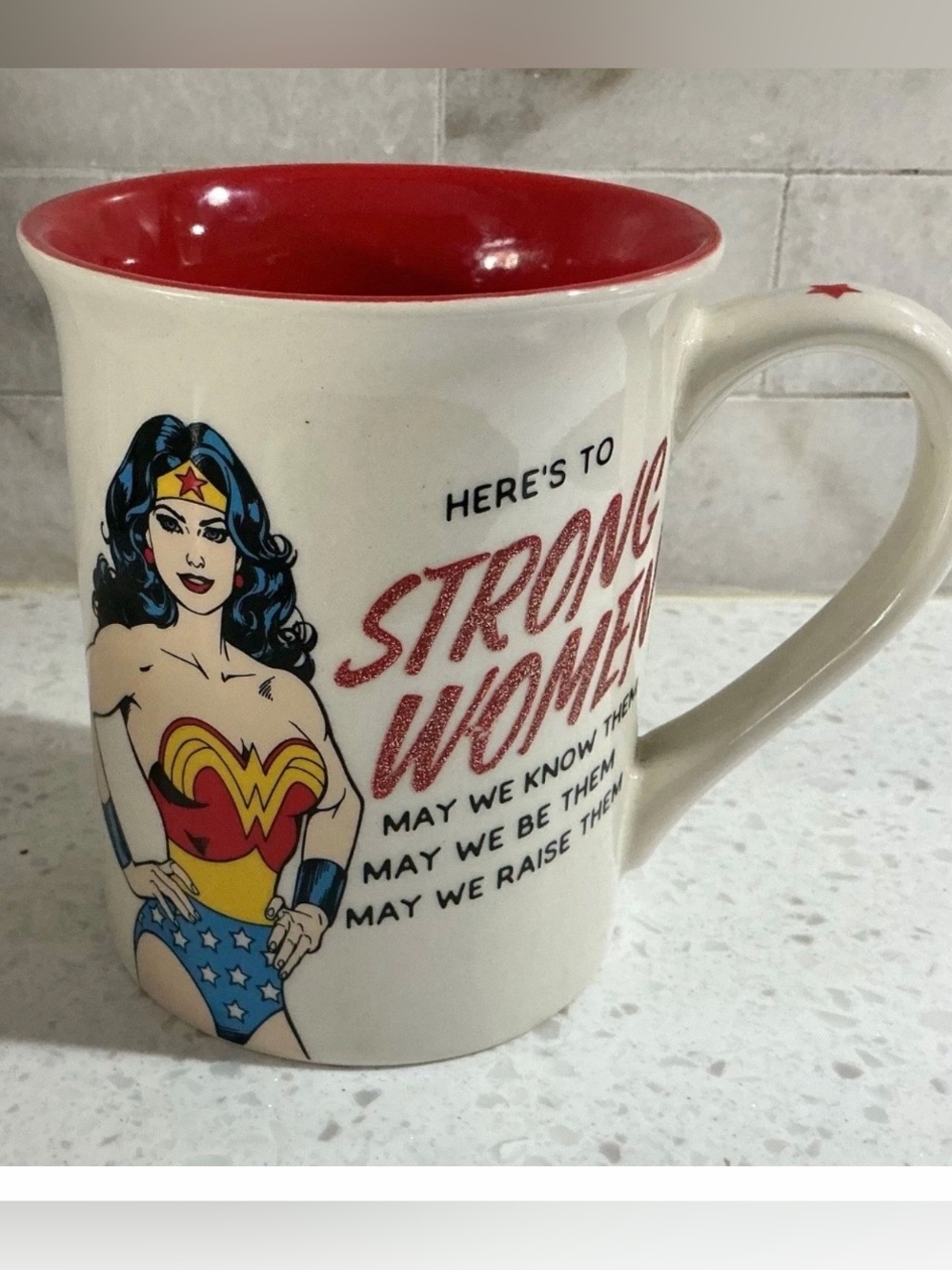 Our Name Is Mud Wonder Woman Strong Women Coffee Mug with Red Glitter Accents.